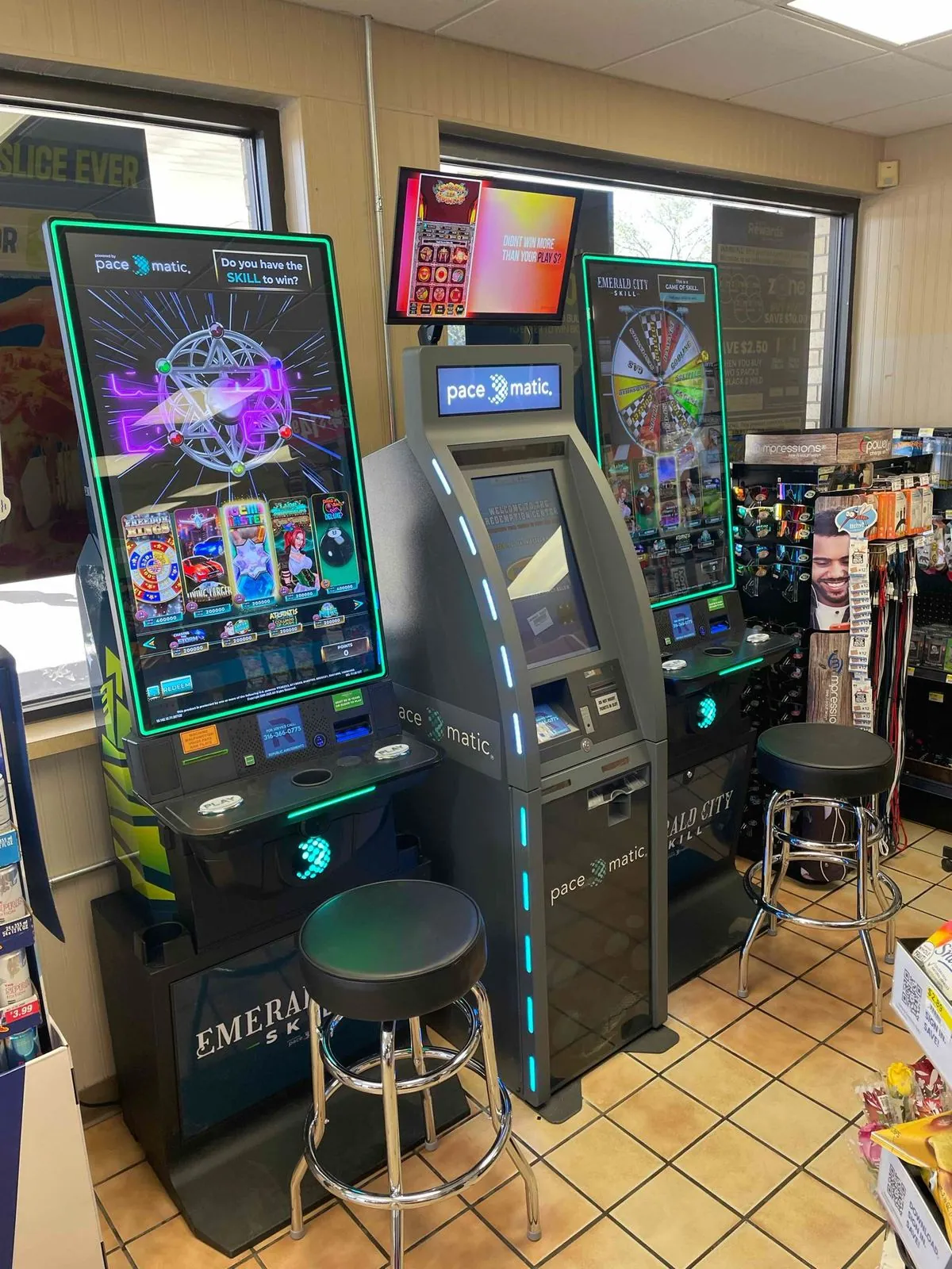 Two Pace-O-Matic skill game terminals on a convenience store floor