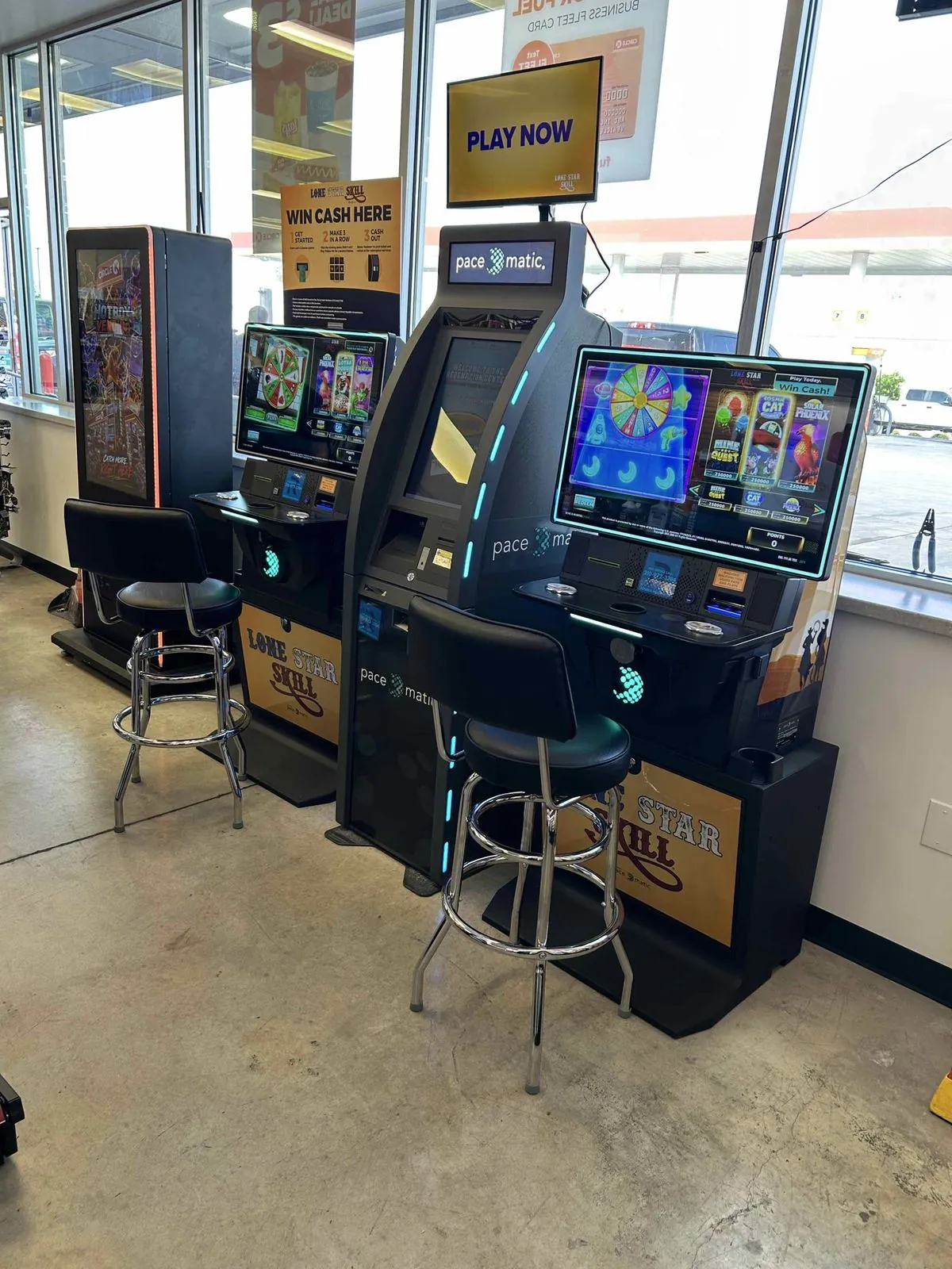 Skill game terminals beside the storefront windows